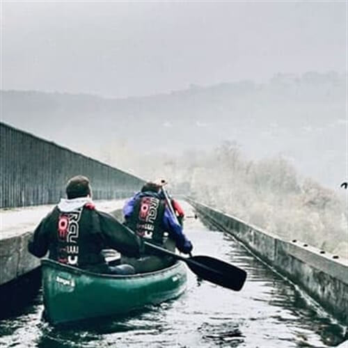 Open Canoeing Couple